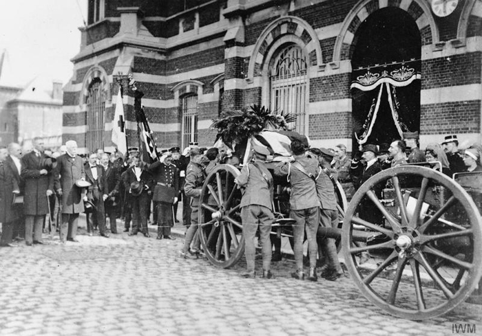 The body of Edith Cavell being taken from the mortuary for transport back to England, 13 May 1919. - © IWM Q 70081