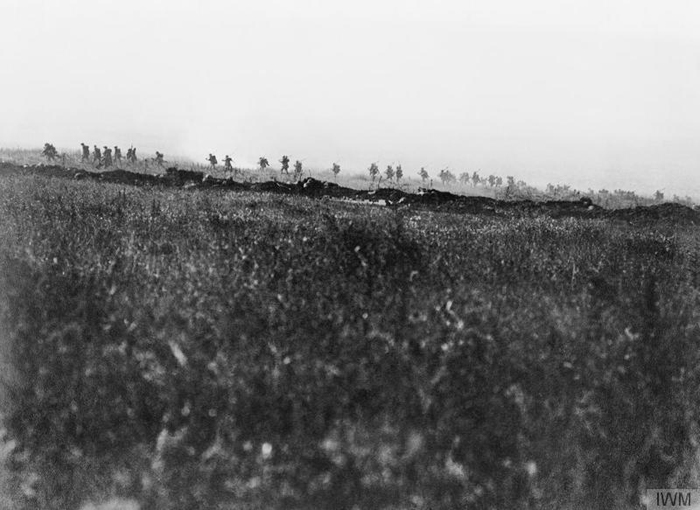 A support company of an assault battalion, of the Tyneside Irish Brigade, going forward shortly after zero hour on 1 July 1916 during the attack on La Boisselle. - Image courtesy of Imperial War Museum: Q 53